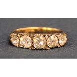Tested as 18ct gold 5 stone diamond ring with 8 diamond chips, total 1.0ct, size L, 3.4g
