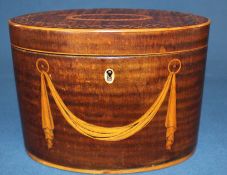 George III oval mahogany tea caddy with inlaid swag to front and geometric inlay to lid, ivory