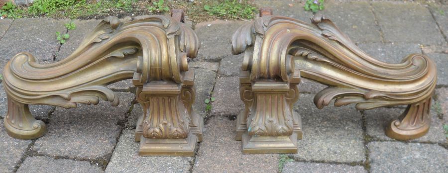 Pair of large rococo bronze fire dogs / chenets L 39cm each