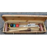 Croquet set comprising 4 mallets, four balls, six hoops, marker post, small mallet & instructions in