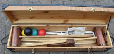 Croquet set comprising 4 mallets, four balls, six hoops, marker post, small mallet & instructions in