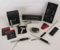 Collection of pipe gadgets to include Dunhill Stainless steel pipe gadget, Dunhill carbon cutter