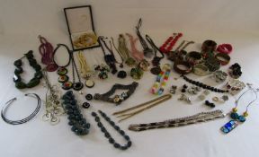 Collection of costume jewellery to include Manouk green necklace, rings, clip earrings and large