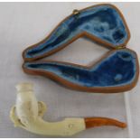 Meerschaum pipe, the bowl inset within carved dragon claws, amber mouth piece and original fitted