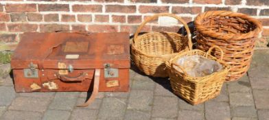 3 wicker baskets & a leather suitcase