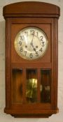 1930's Junghans gong striking wall clock in an oak case