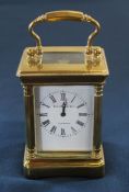 Small French brass carriage clock, the face marked Elliott & Son London height approximately 11.