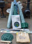 3 large green patio parasols, 2 small parasols, 2 cast iron bases, small Peacock garden table &