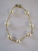 9ct gold and fresh water pearl bracelet - total weight 5.7g