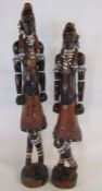 Pair of African tribal figures with beads and shells tall one approx.28.5cm - other approx. 27.5cm