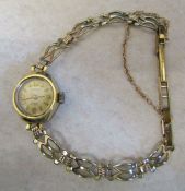 9ct gold ladies Rotary 17 jewels wrist watch with 9ct gold strap (fastening clip in rolled gold)