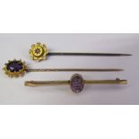 2 stick pins and a brooch - tested as 9ct gold with amethyst total weight 1.7g - 9ct gold pin with