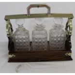 Late Victorian rosewood (repaired) 3 decanter tantalus (one damaged)