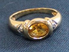 9ct gold citrine & diamond chip ring, size N, 3.32g