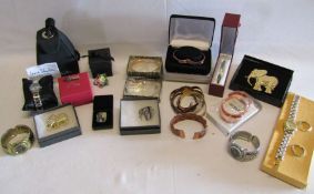 Collection of items to include Jane Shilton watch, elephant brooches, copper bracelets etc