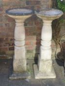Pair of concrete bird baths on columns Ht 98cm