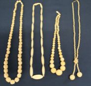 Four early 20th century carved ivory bead necklaces