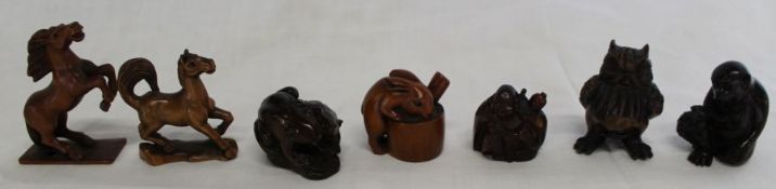 7 Japanese hardwood netsuke:- 2 horses, rabbit & old man with carved signatures and monkey and toad,