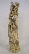 Meiji period carved ivory Japanese okimono depicting man carrying men approx. 27.5cm (base loose)