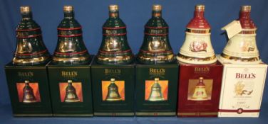 6 Bell's Extra Special Old Scotch Whisky Christmas Decanters 1992, 1993, 1994, 1995, 1996, 1997, all