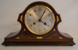 Striking mantel clock with German movement in a mahogany case inlaid with mother of pearl L 41cm