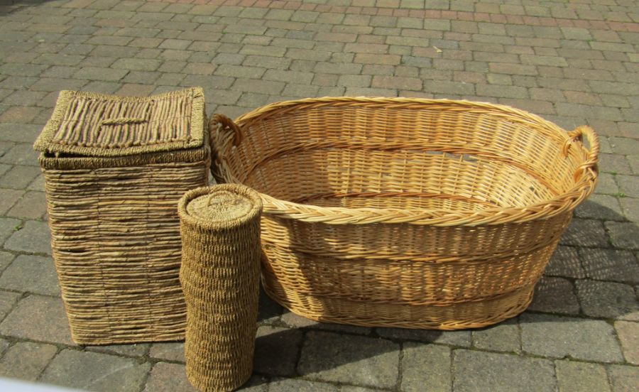 A large wicker basket, laundry basket and toilet roll basket