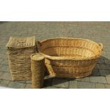 A large wicker basket, laundry basket and toilet roll basket