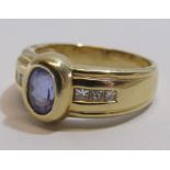 Marked 14kt gold ring with tanzanite and diamond - tanzanite measures approx. 7mm total weight 5.