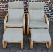 Pair of easy armchairs with leg rests