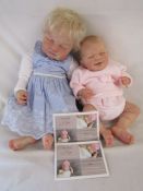 2 Reborn baby dolls - 21" weighted doll with closed eyes and pale blonde hair and an 18" limited