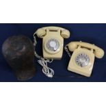 Wall mounted cream rotary dial telephone &  one other and a copper hat block