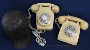 Wall mounted cream rotary dial telephone &  one other and a copper hat block