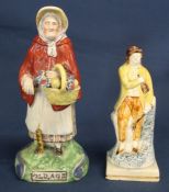 19th century Staffordshire pearlware figure depicting "Old Age" as an elderly lady with walking