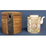 Chinese famille rose tea kettle with saucer lid in fitted wicker basket, height of kettle 17cm (
