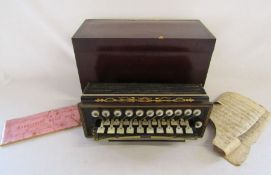 Unmarked but possibly Busson Brevete Paris flutina accordion with mother of pearl keys