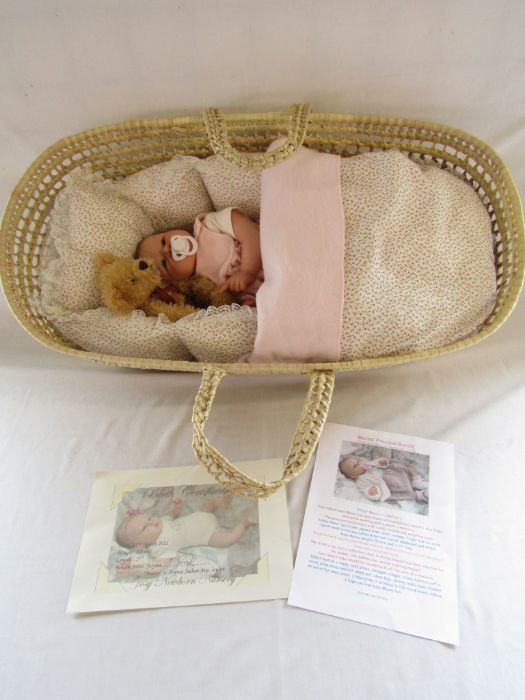 Reborn baby doll ' Macey' by artist Josynn with moses basket and teddy bear has fine hair, open eyes