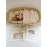 Reborn baby doll ' Macey' by artist Josynn with moses basket and teddy bear has fine hair, open eyes