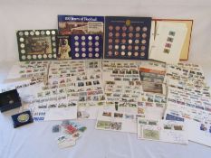 Selection of collectors coin tokens, first day covers and a silver St Christopher with necklace