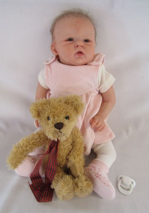 Reborn baby doll ' Macey' by artist Josynn with moses basket and teddy bear has fine hair, open eyes - Image 5 of 9