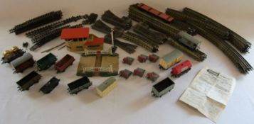 Hornby-Dublo railway track and carriages, crossings, signal house etc, also includes some super