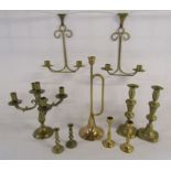 Collection of brass candlesticks