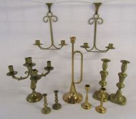 Collection of brass candlesticks