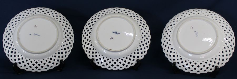 Three Meissen ribbon plates with hand painted floral decoration bearing the underglazed blue crossed - Image 3 of 3