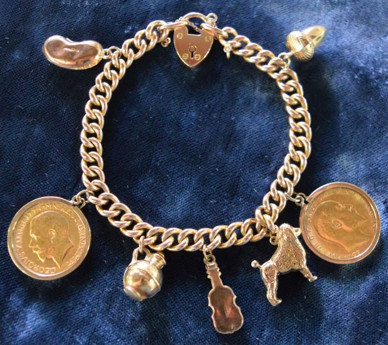 Charm bracelet (tested as 15ct gold) with padlock stamped 15ct  with 2 full sovereigns (1910 & 1912) - Image 2 of 2