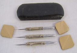 Cased set of Turner & Simpson 1937 silver darts with paper flights total weight 1.22 ozt
