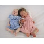 2 Reborn baby dolls weighted baby with closed eyes and painted hair and 20" weighted baby with