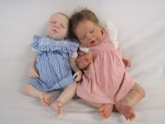 2 Reborn baby dolls weighted baby with closed eyes and painted hair and 20" weighted baby with