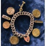9ct gold charm bracelet with 4 full sovereigns (2 x 1910, 1911 & 1967), half sovereign (1912), 2 9ct