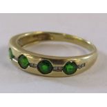 9ct gold QVC ring set with possibly green garnet and diamond - ring size R - total weight 2.5g