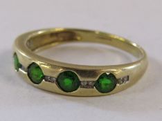 9ct gold QVC ring set with possibly green garnet and diamond - ring size R - total weight 2.5g